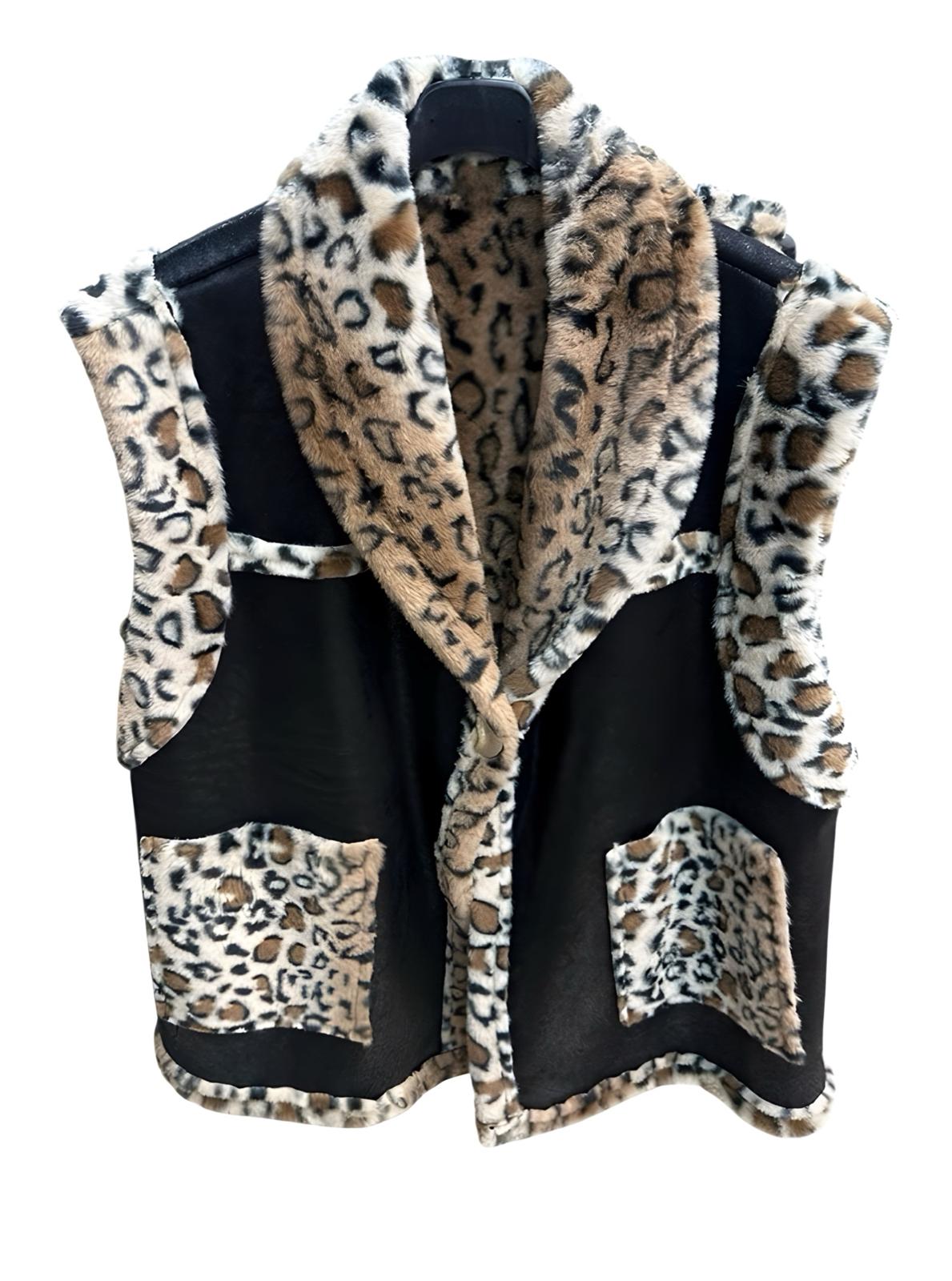 Leopard print vest over a black shirt on a white background